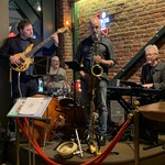 2025 Dr Cohen performing on saxophone